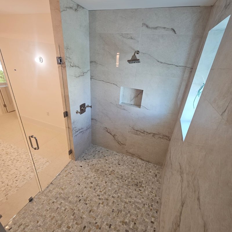 Tile Shower floors and marble tile walls