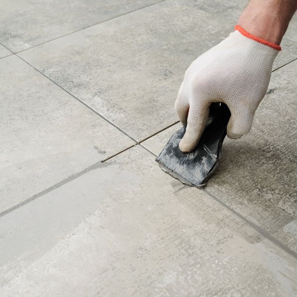 Applying flooring grout