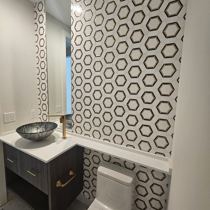 Geometric tile walls in a Florida bathroom